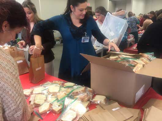 In spirit of giving, Upstate prepares 1,300 lunches for the Rescue Mission