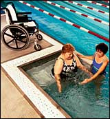 A WEALTH project participant with University Hospital Physical Therapist in the Institute's wheelchair-accessible, adjustable bottom pool. 