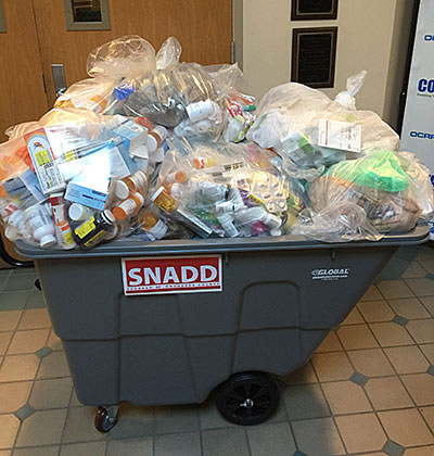 Container full of disposed sharps