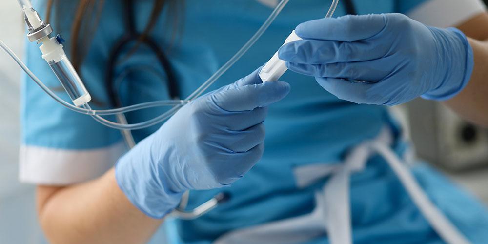 Doctor checking IV