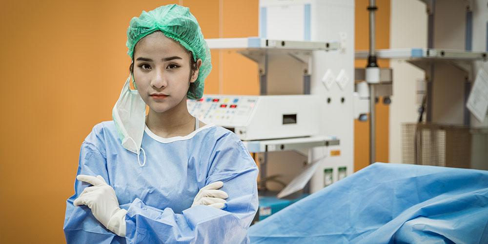 Doctor waiting by equipment