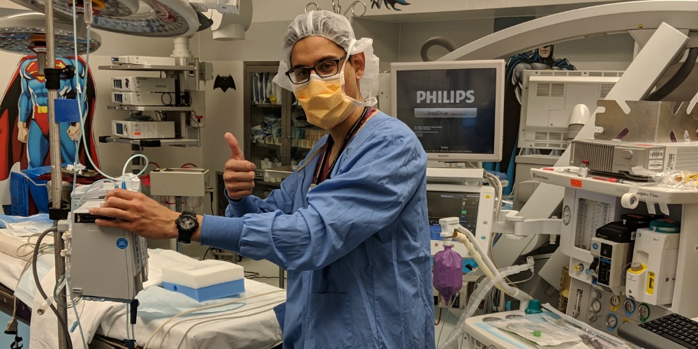 A resident giving a thumbs up in the OR