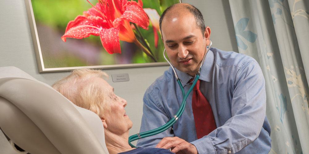 Kaushal Nanavati, MD with patient