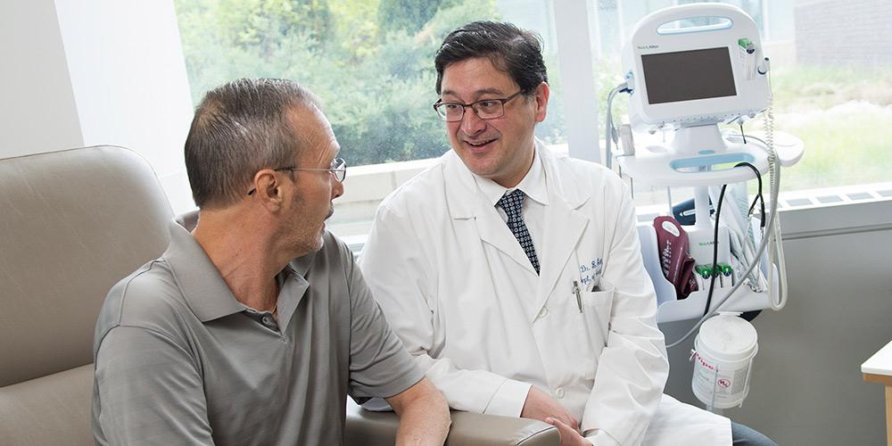 Dr. Michael Seth with patient