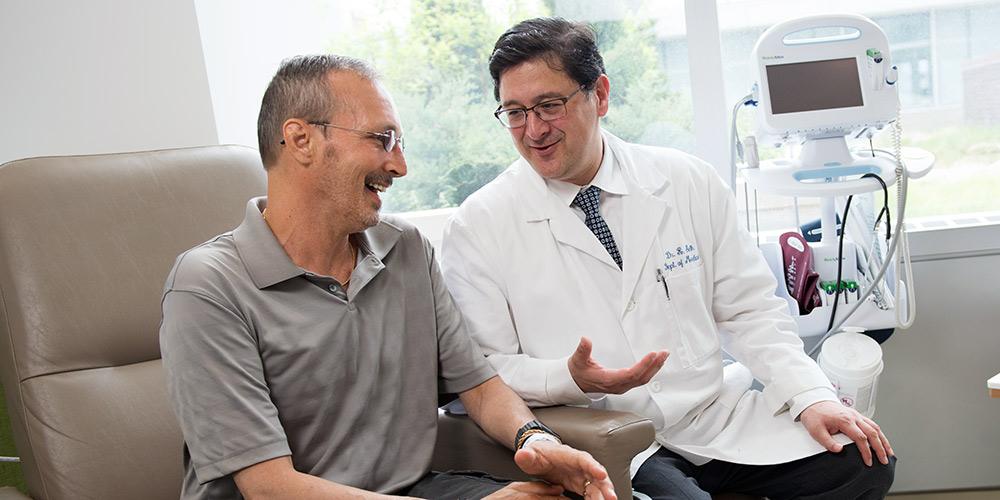 Dr. Rahul Seth with patient