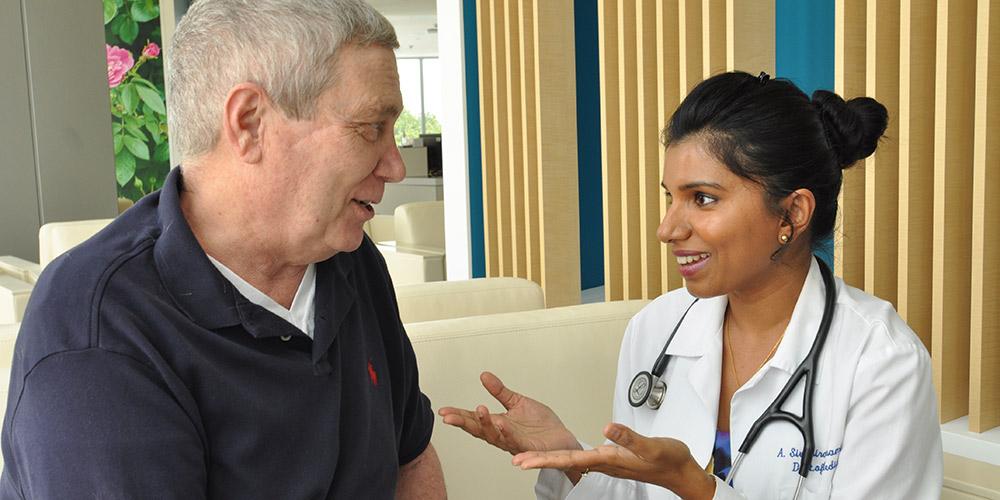 Dr. Siva with patient