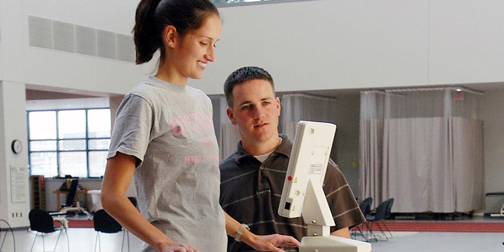 physical therapist with patient