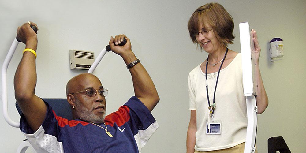 physical therapist with patient