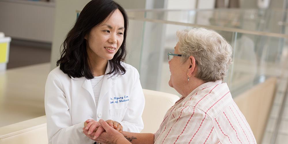 Dr Lee with Patient