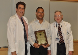 Denzil Harris Receiving the Award