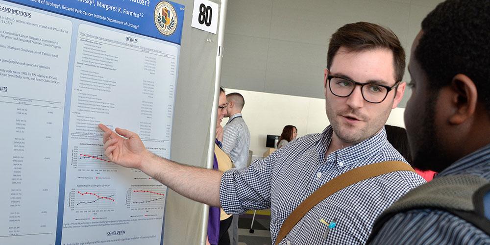 Kyle Plante explaining his research