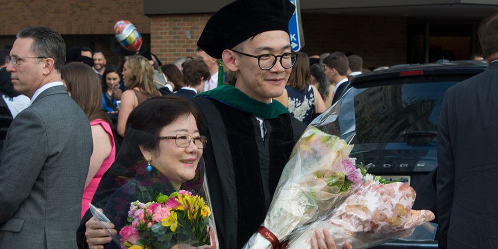 2018 Graduate with his mother
