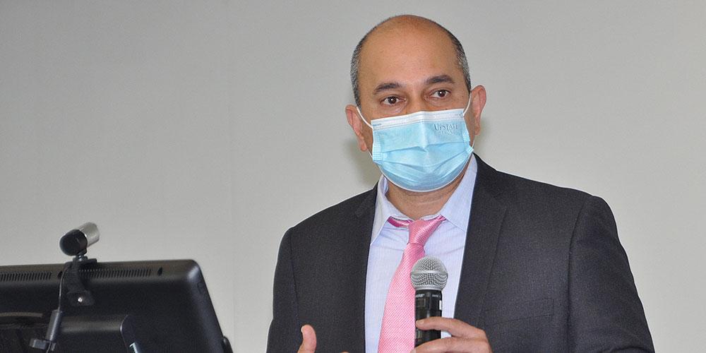 Dr. Nanavati at podium for 2021 Whitney Lecture Series