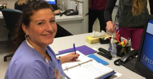 Julie Francey, RN, at the Nurses Station
