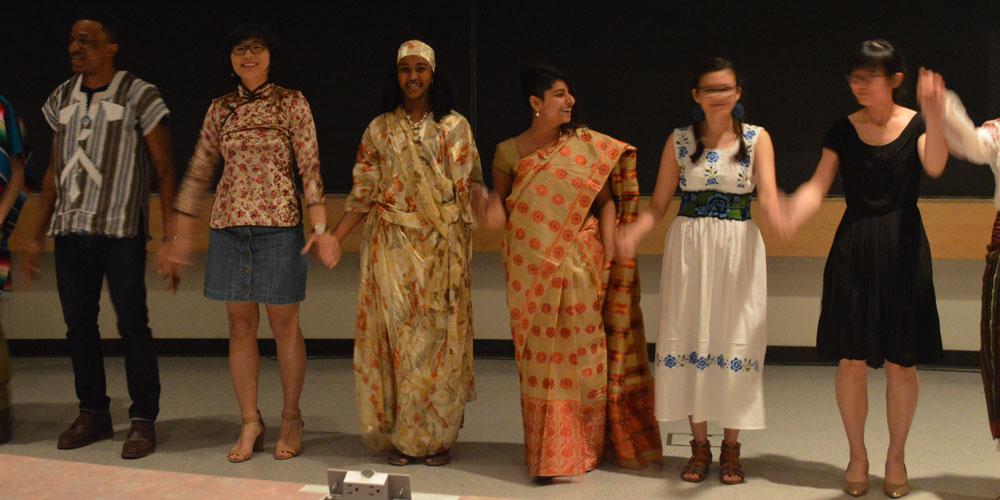 Students holding hands
