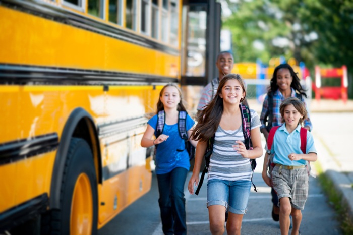 Kids near school bus