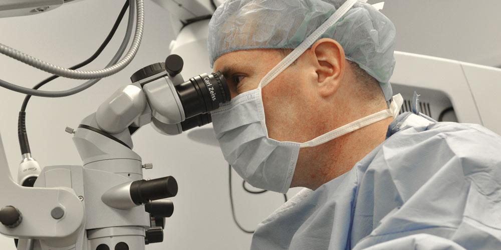 Dr. Alpert (Clinic Director) in surgery