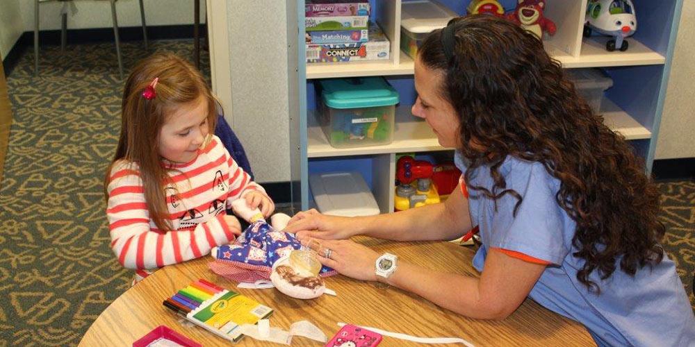 pre-operative program: child life specialist with patient