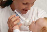 baby safety: mother feeding baby