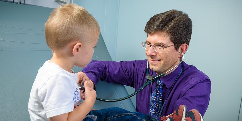 Dr. Fortner with cystic fibrosis patient