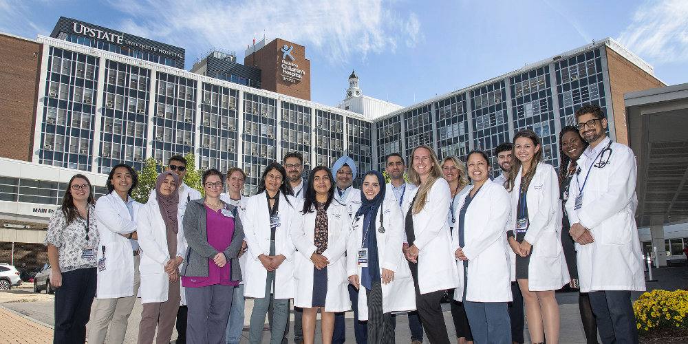 Hospitalist group in front of Upstate downtown hospital