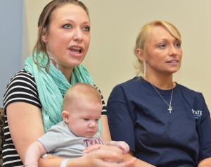 Victoria Fitzpatrick holds her baby, Carter, as she talks about receiving a new kidney from Upstate nurse Jody Adams (right). (PHOTO BY WILLIAM MUELLER)