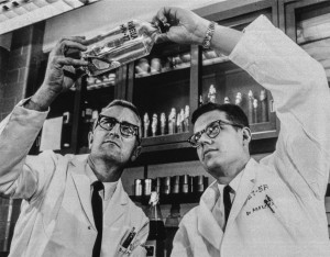 Paul Parkman, MD, right, is shown in the 1960s with Harry Meyer Jr., MD, inspecting a culture of the rubella virus. They were part of a research team whose work led to a successful vaccine against rubella, or German measles. (file photo)