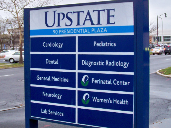 This branded sign makes it clear that this outpatient facility is part of Upstate University Hospital.
