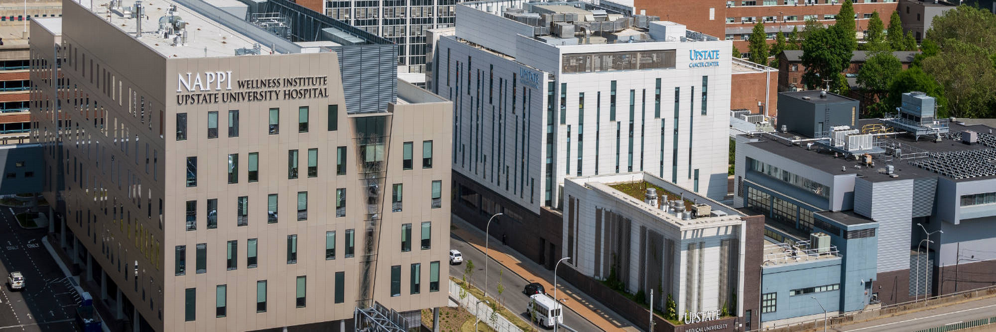 an aerial view of the upstate campus featuring the Nappi wellness institute in the foreground