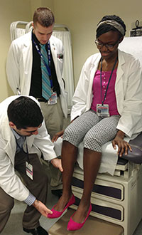med students in standardized patient program