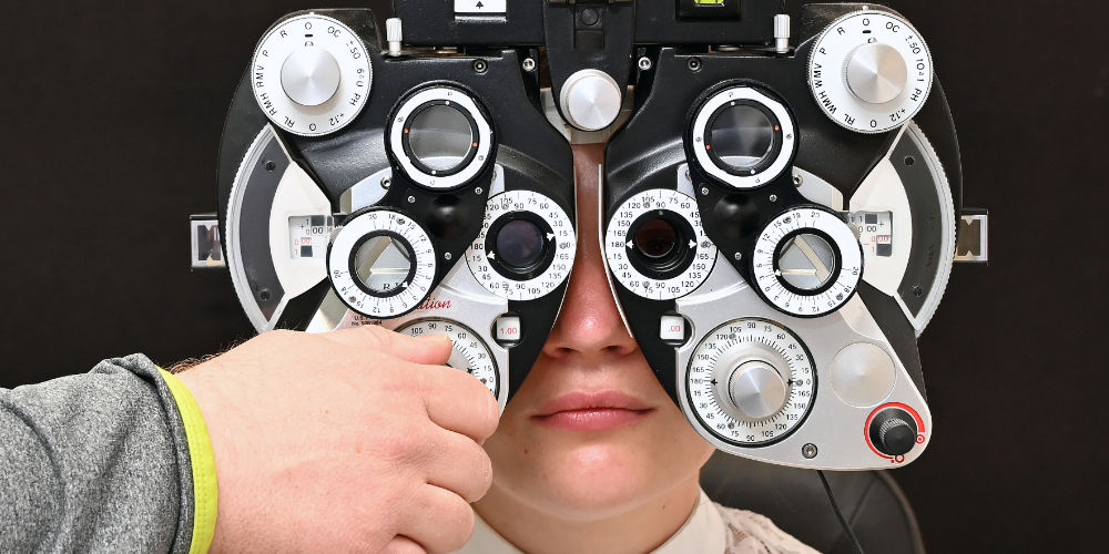 Patient in front of a vision tester