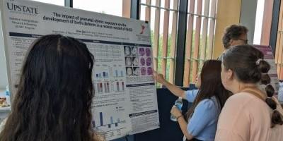 Olivia explaining her poster.