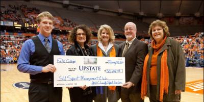 Syracuse University Sports Management Club donates to Upstate Cancer Center