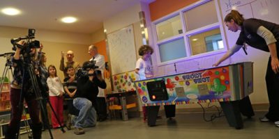 11-year-old patient donates air hockey table to Upstate Golisano Children's Hospital