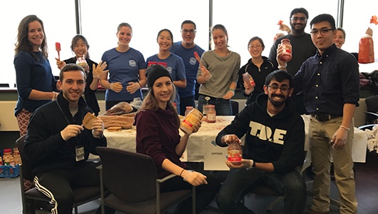 In celebration of Martin Luther King Day, Upstate Medical University students make peanut butter and jelly sandwiches to be donated to the Rescue Mission, Samaritan Center and Meals on Wheels.