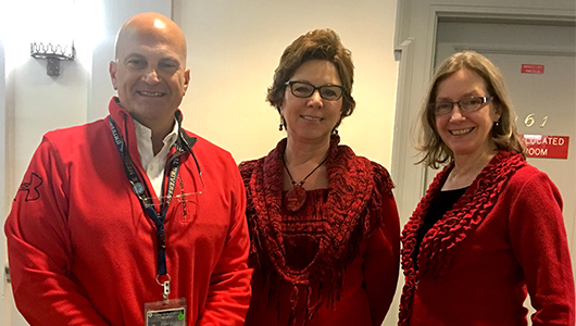 Many employees across campus wore red today to celebrate Go Red Day to raise awareness of heart disease and heart health. This trio was found outside the Office of the President.