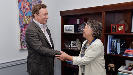 President Laraque-Arena welcomes Julio Licinio, MD, PhD