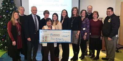 Paige's Butterfly Run presents $210,000 donation for pediatric cancer care, research