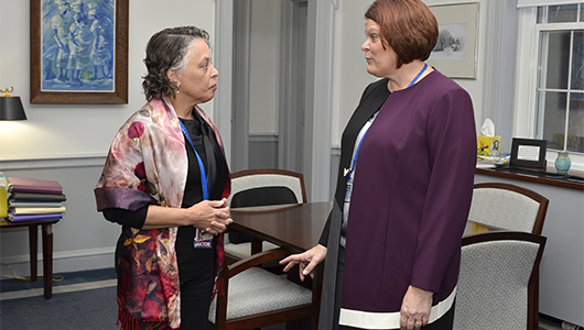 Tammy Austin-Ketch, PhD, FNP, BC, FAANP, right, on her first day as deanof the College of Nursing Jan. 16, visits with Upstate Medical University President and HealthSystem CEO Danielle Laraque-Arena, MD, FAAP.