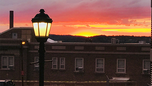 A brilliant sunset in Syracuse as seen recently from the Upstate Medical University campus.