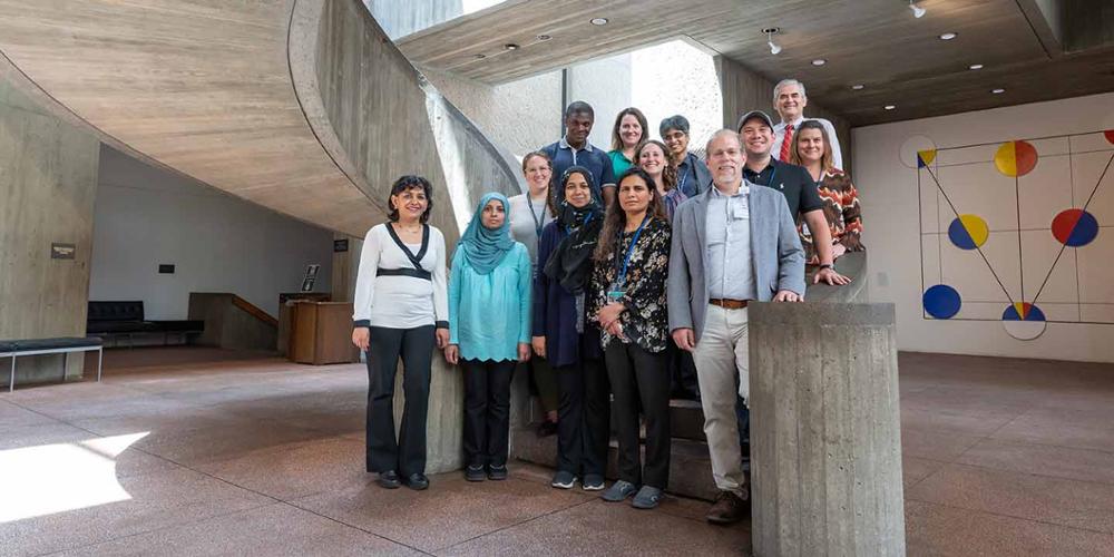Members of the 2019 Family Medicine Residency Program stand for a photo at the Everson Museum of Art in downtown Syracuse during an orientation session earlier this summer.