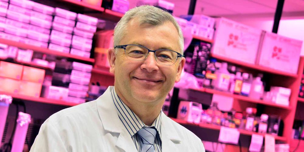Leszek Kotula, MD, PhD, an associate professor of urology, biochemistry and molecular biology, stands in his lab at Upstate Medical University.