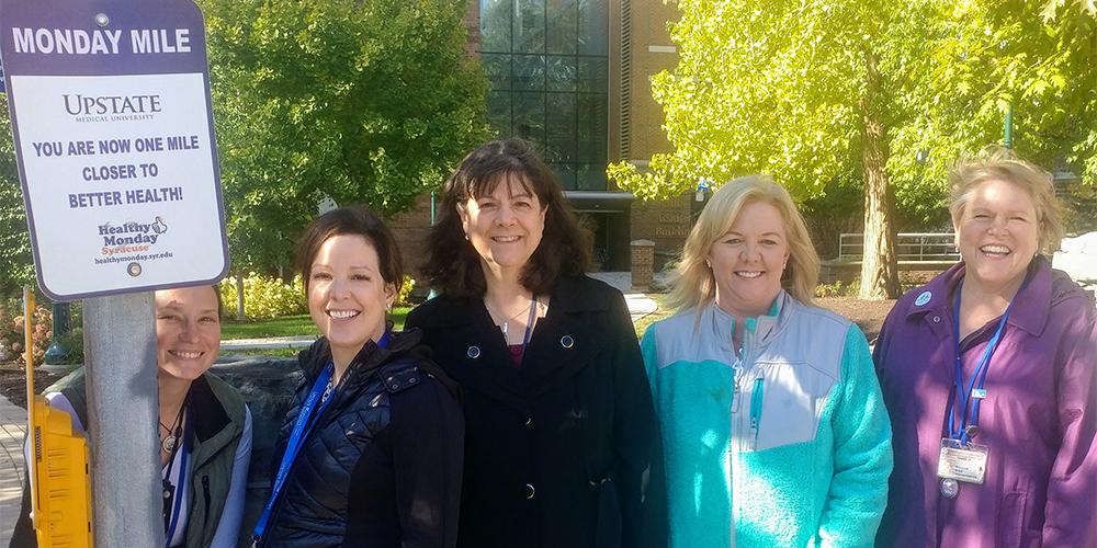 Upstate employees take advantage of the beautiful fall weather to participate in the Pathways to Wellness program's Monday Mile lunchtime walk.