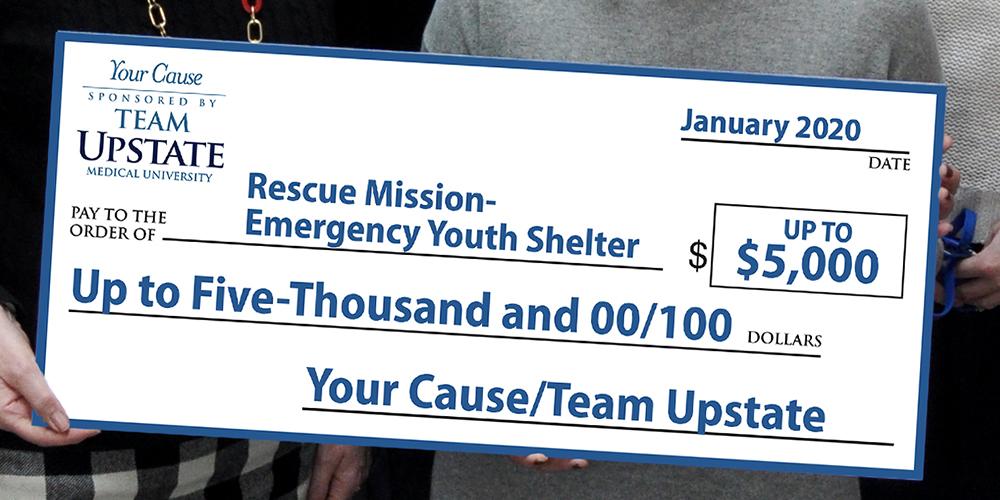 Upstate presents check to support the proposed emergency shelter for runaway youth