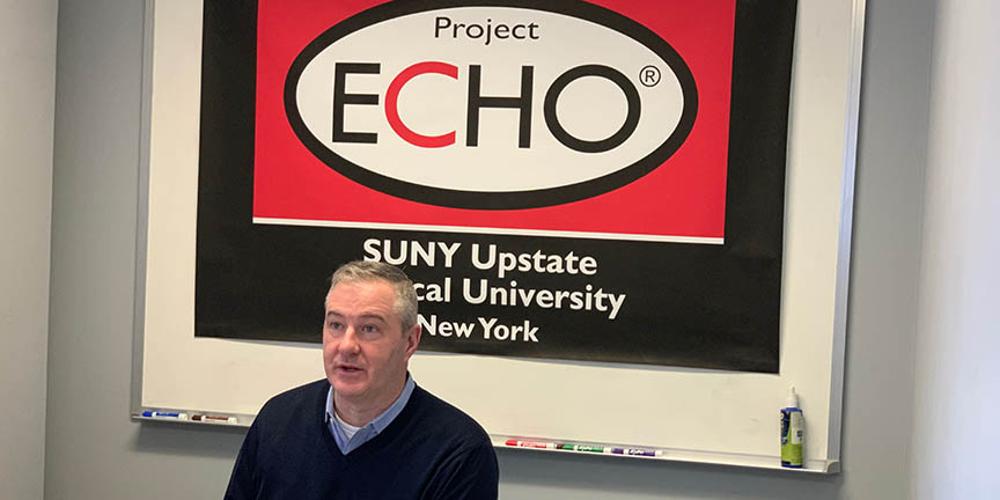 Stephen Thomas, MD, conducting a Project ECHO session on March 17.