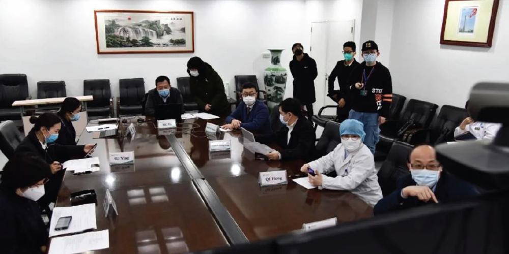 Doctors in Wuhan talking with doctors at Upstate via video conference.