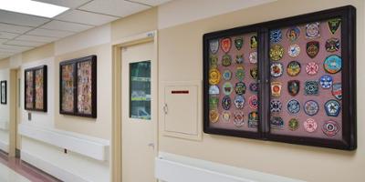 More than 250 fire department logo patches fill Clark Burn Center with gratitude