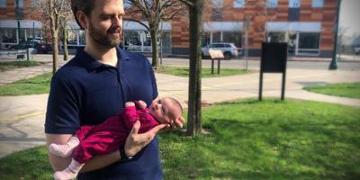 Graduate's new title is not only doctor, it’s also Dad