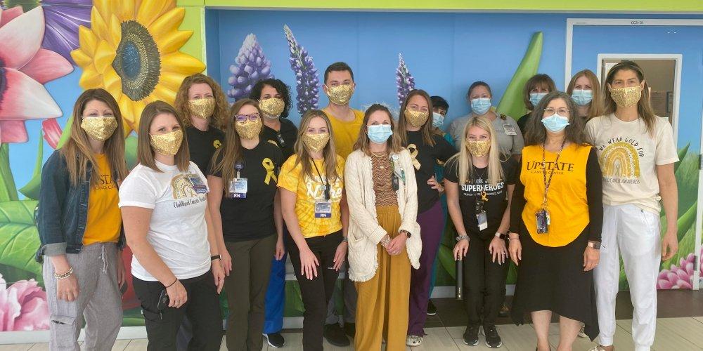 GOING GOLD: Upstate’s pediatric cancer team goes gold to support Pediatric Cancer Awareness Month.