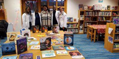 With books and inspirational messages, Upstate medical students visit elementary school